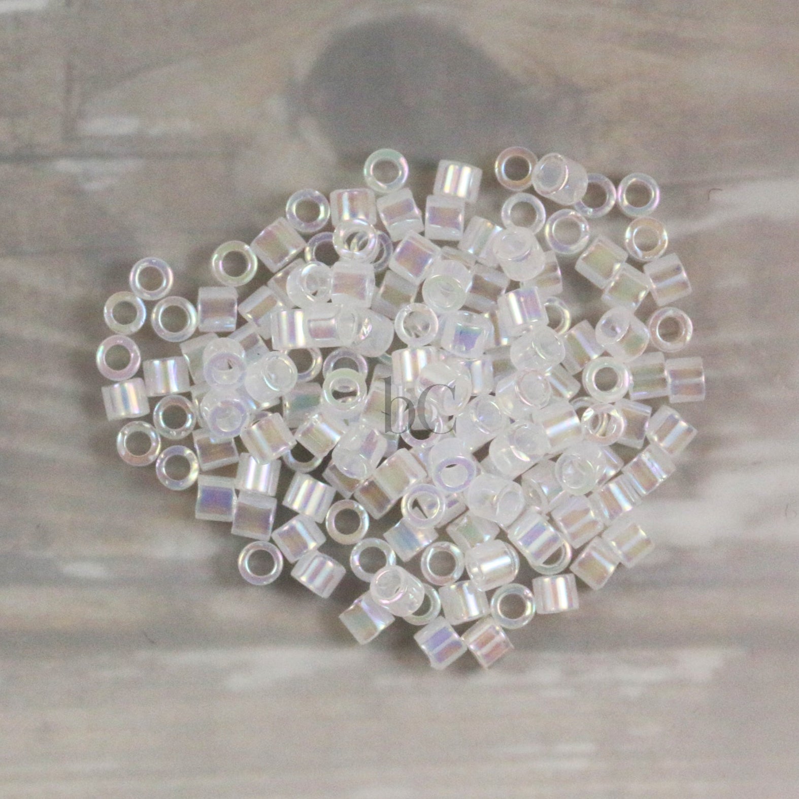 Miyuki 10/0 Delica Seed Beads, White Opal AB # 222 ~ 7.2 Grams