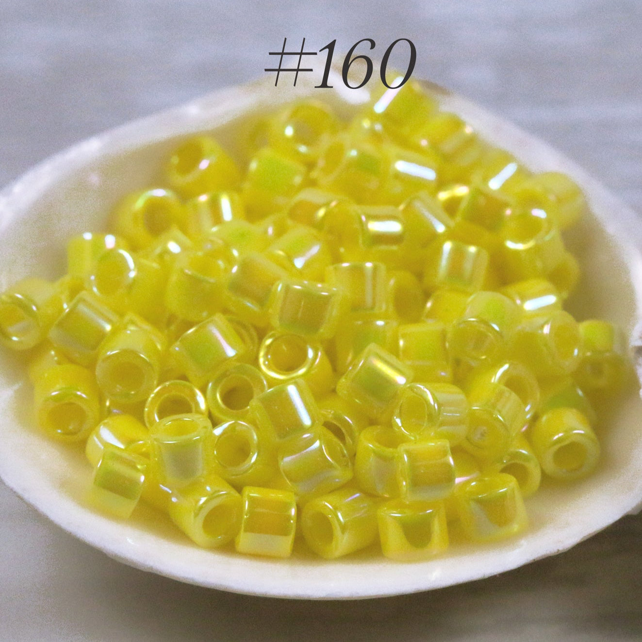Miyuki 10/0 Delica Seed Beads, Opaque Yellow AB # 160 ~ 7.2 Grams