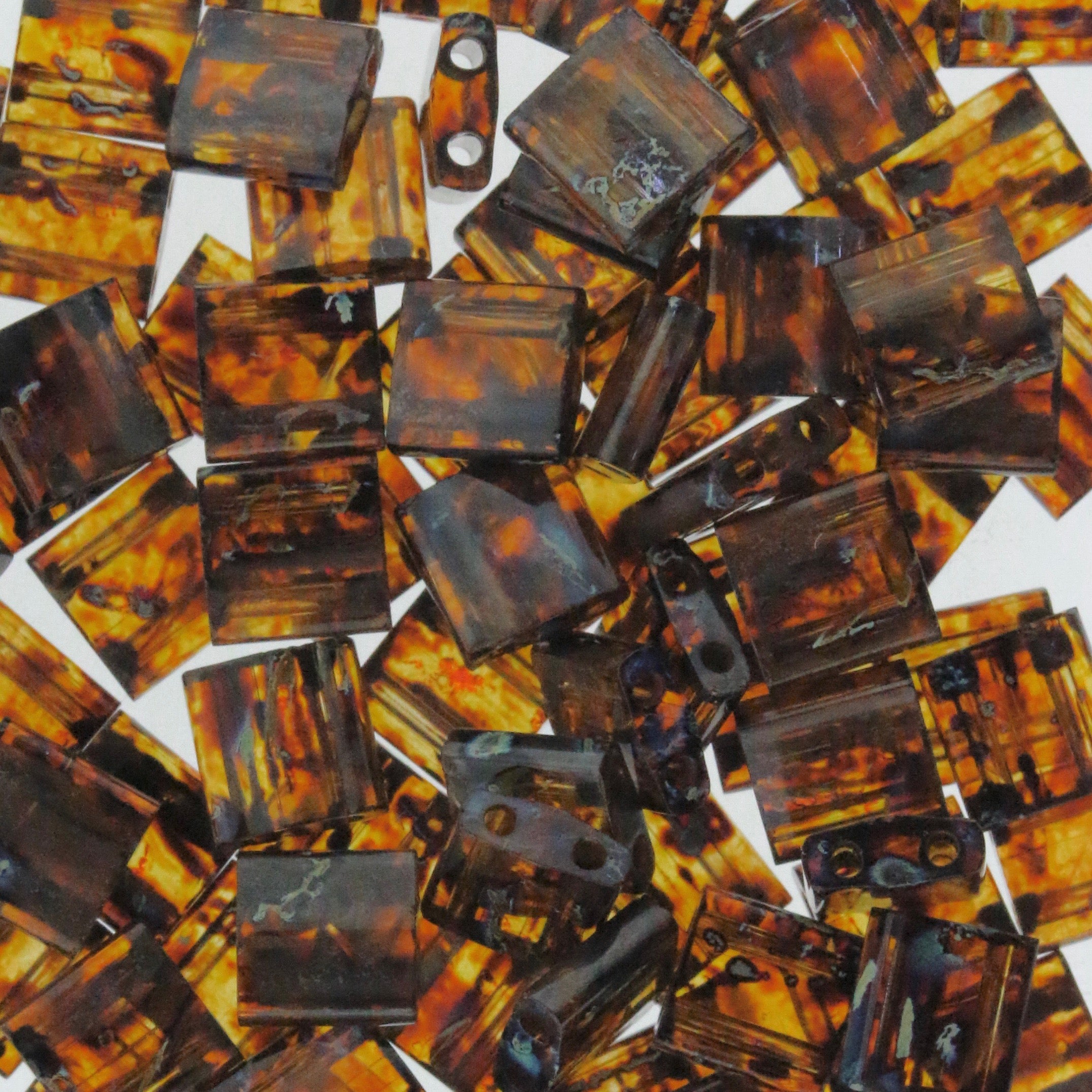 MIYUKI Full Tila Beads, Transparent Dark Topaz Picasso # 4502 - 10 grams