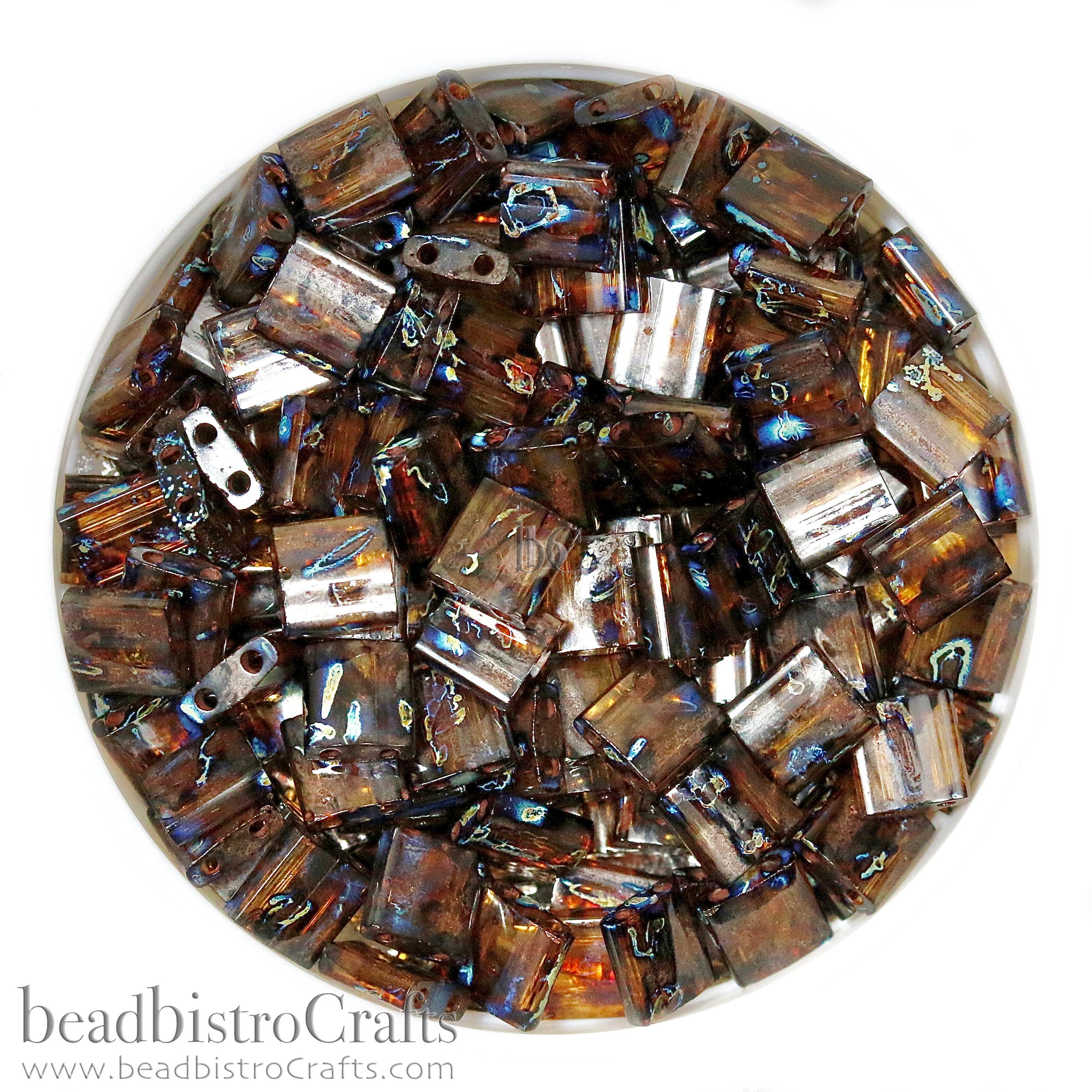 MIYUKI Full Tila Beads, Transparent Dark Topaz Picasso # 4502 - 10 grams