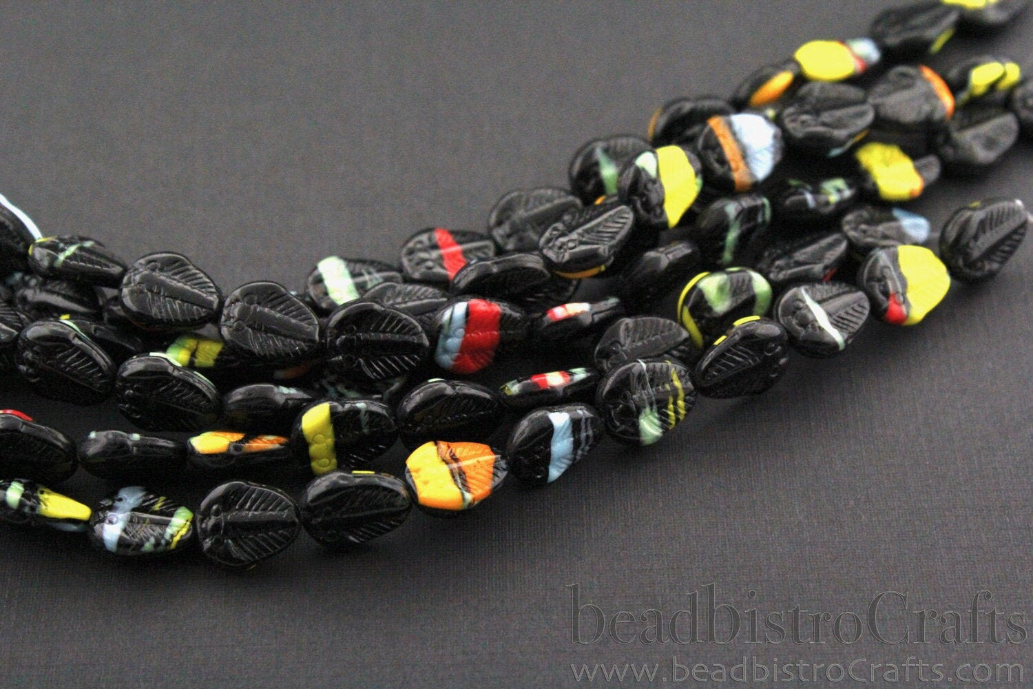 Czech TRILOBITE beads 15pcs - pressed glass multi-color Black Trilobite beads - bright opaque orange, red, yellow, green, blue, ....