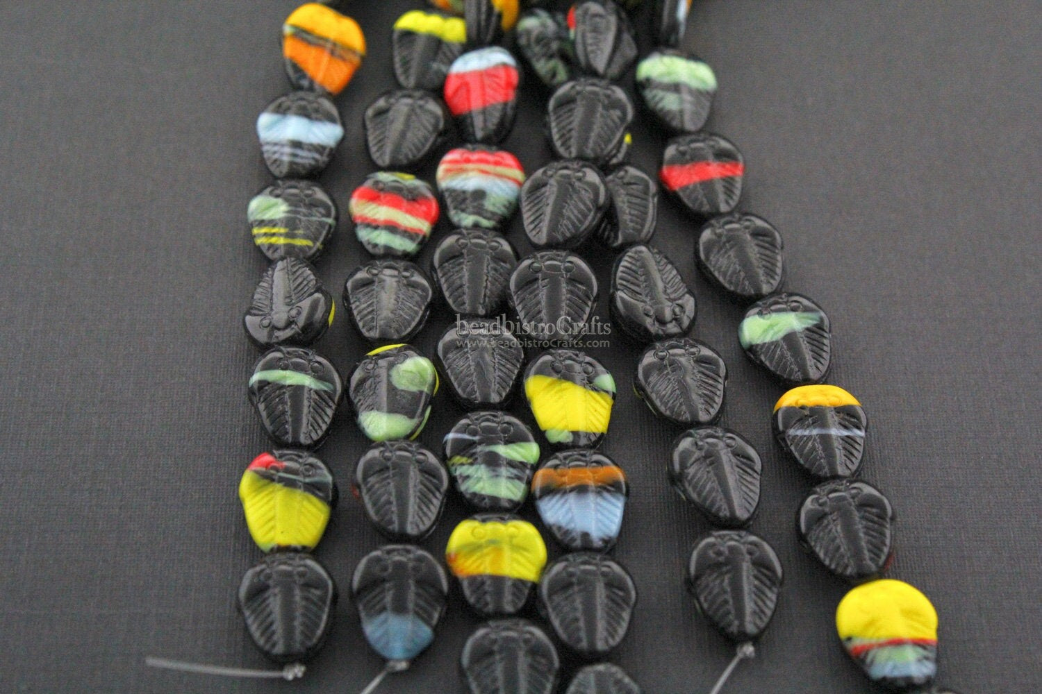 Czech TRILOBITE beads 15pcs - pressed glass multi-color Black Trilobite beads - bright opaque orange, red, yellow, green, blue, ....