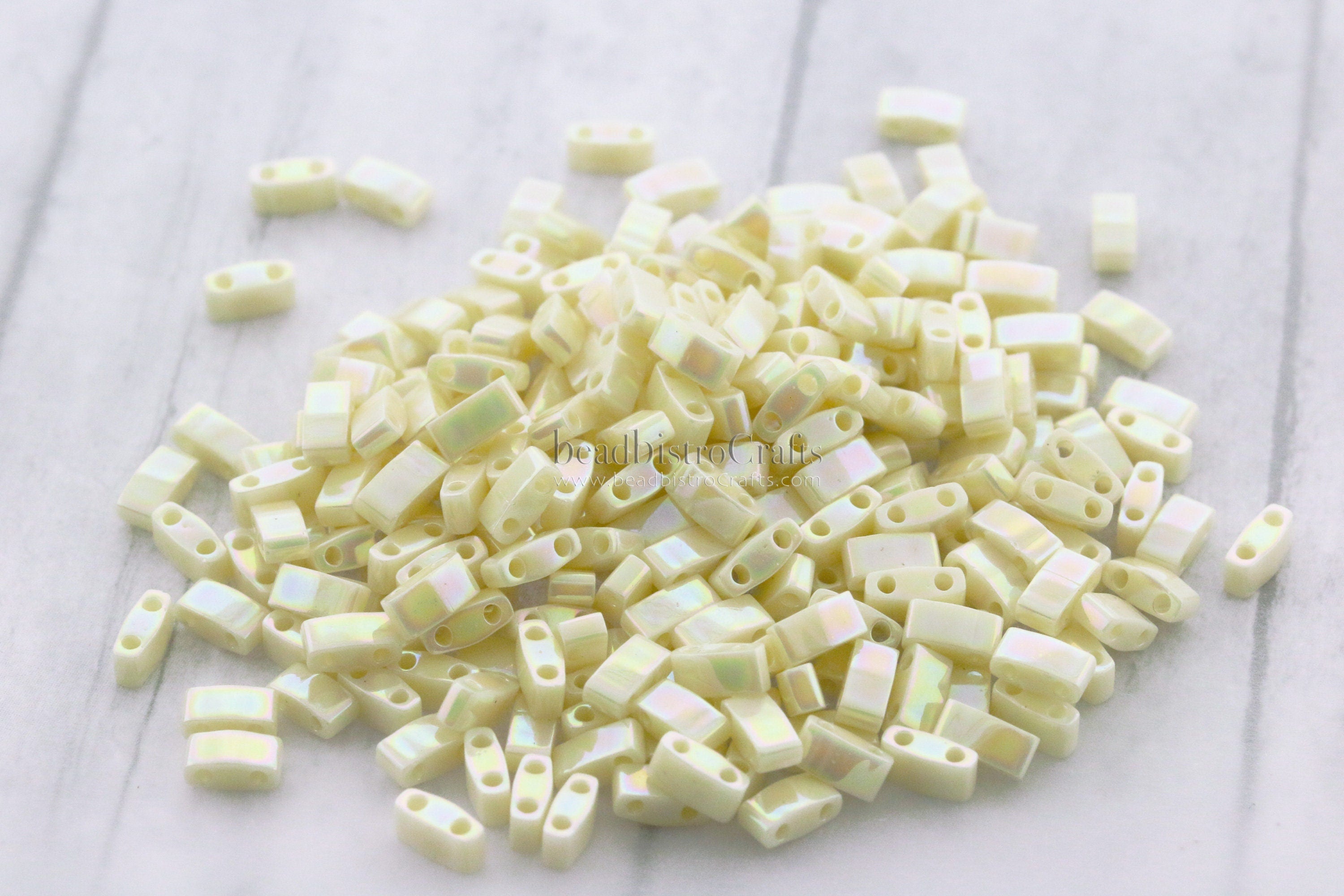 10g MIYUKI - Half Tila Beads - Ivory Pearl CEYLON AB - size 5mm x 2.3mm x 1.9mm - 2 hole - 1/2 Tila # 486